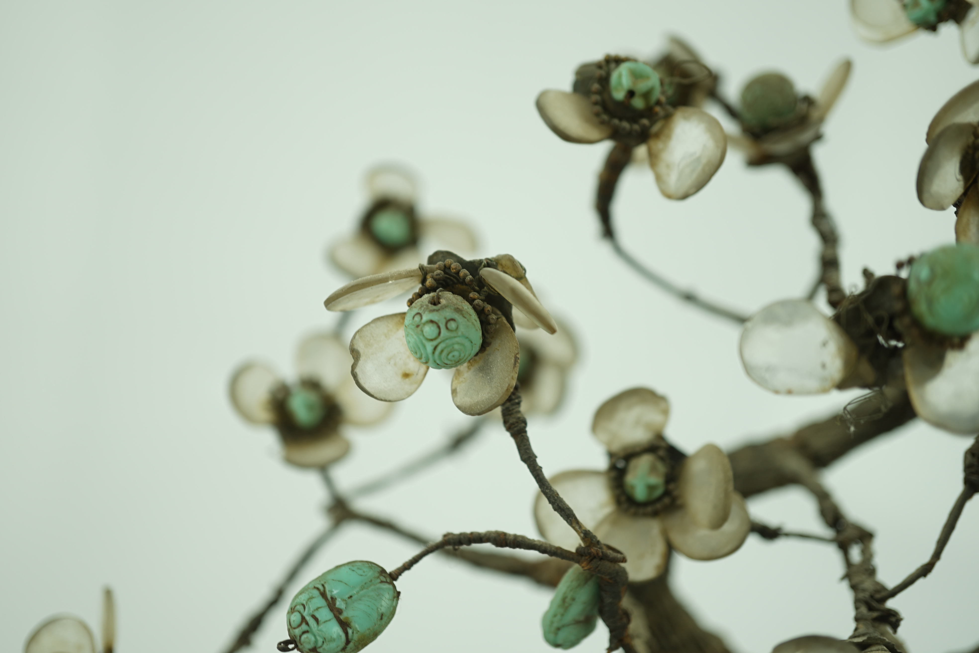 A Chinese cloisonné enamel jardiniere housing a glass mounted model tree, 19th century